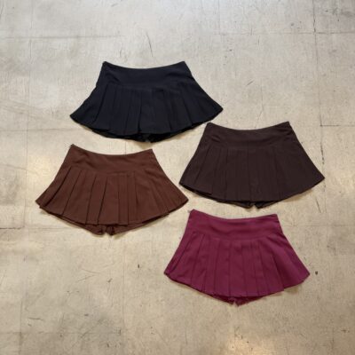 Pollera mini tiro bajo Tableada c. Short Adentro